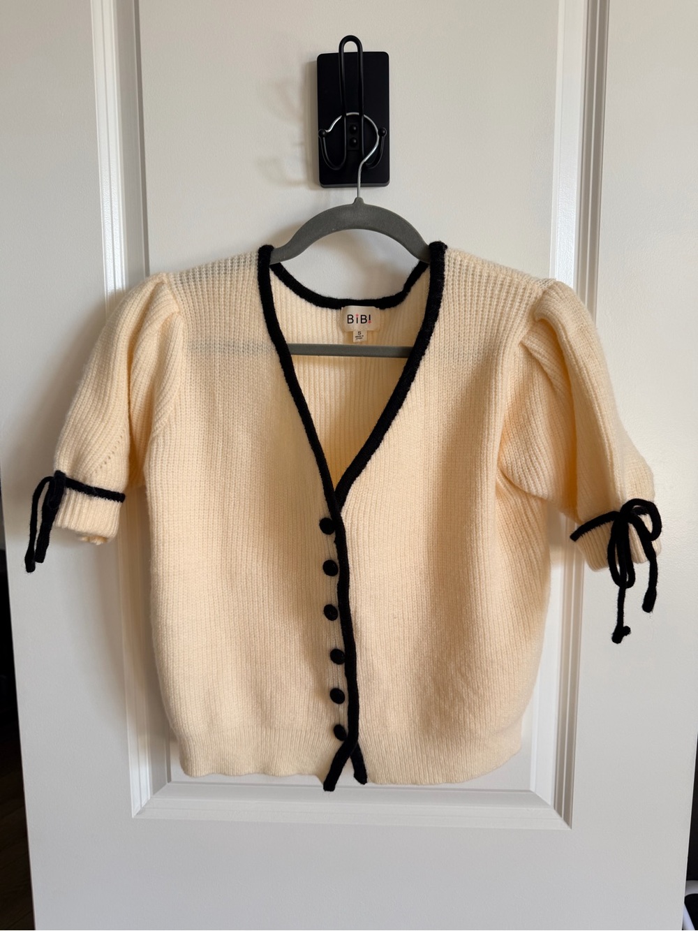 BiBi Cream Knit Short-Sleeve Cardigan with Black Trim and Ties